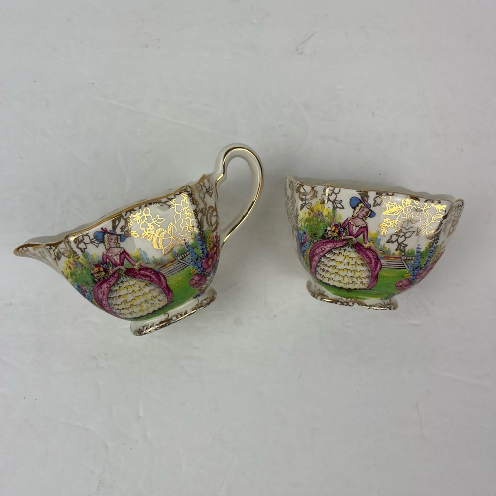 Vintage Elijah Cotton-ltd Nelson Ware cream and sugar set w/floral & lady